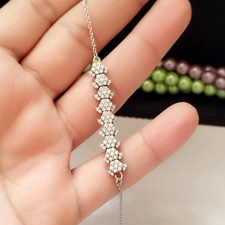 دستبند نقره زنانه عیار 925 طرح جواهری روکش طلا سفید وزن 4.49 گرم